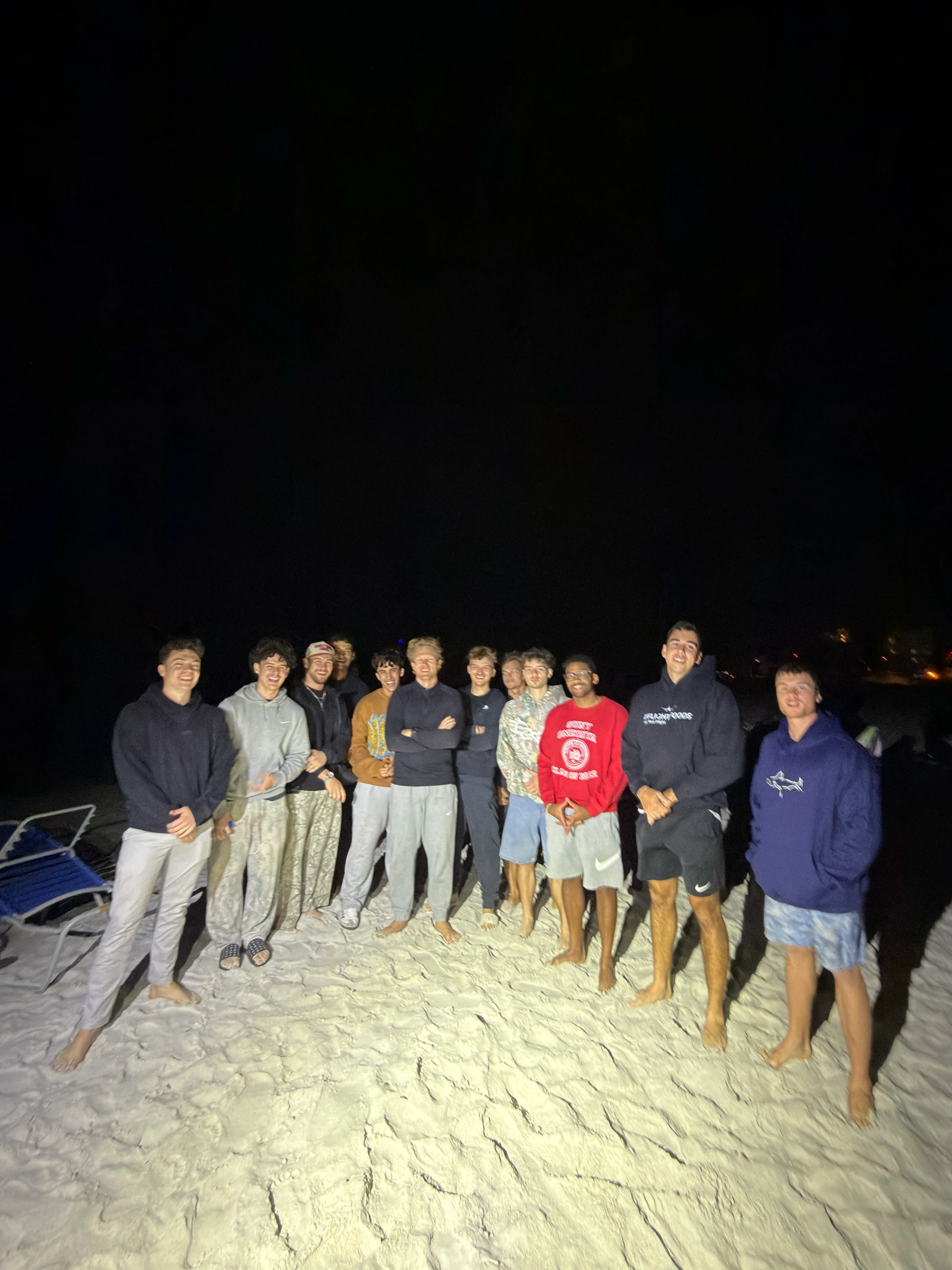 A group photo from a night at the beach